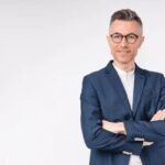 goodlooking-middleaged-businessman-arms-crossed-600nw-1929520217